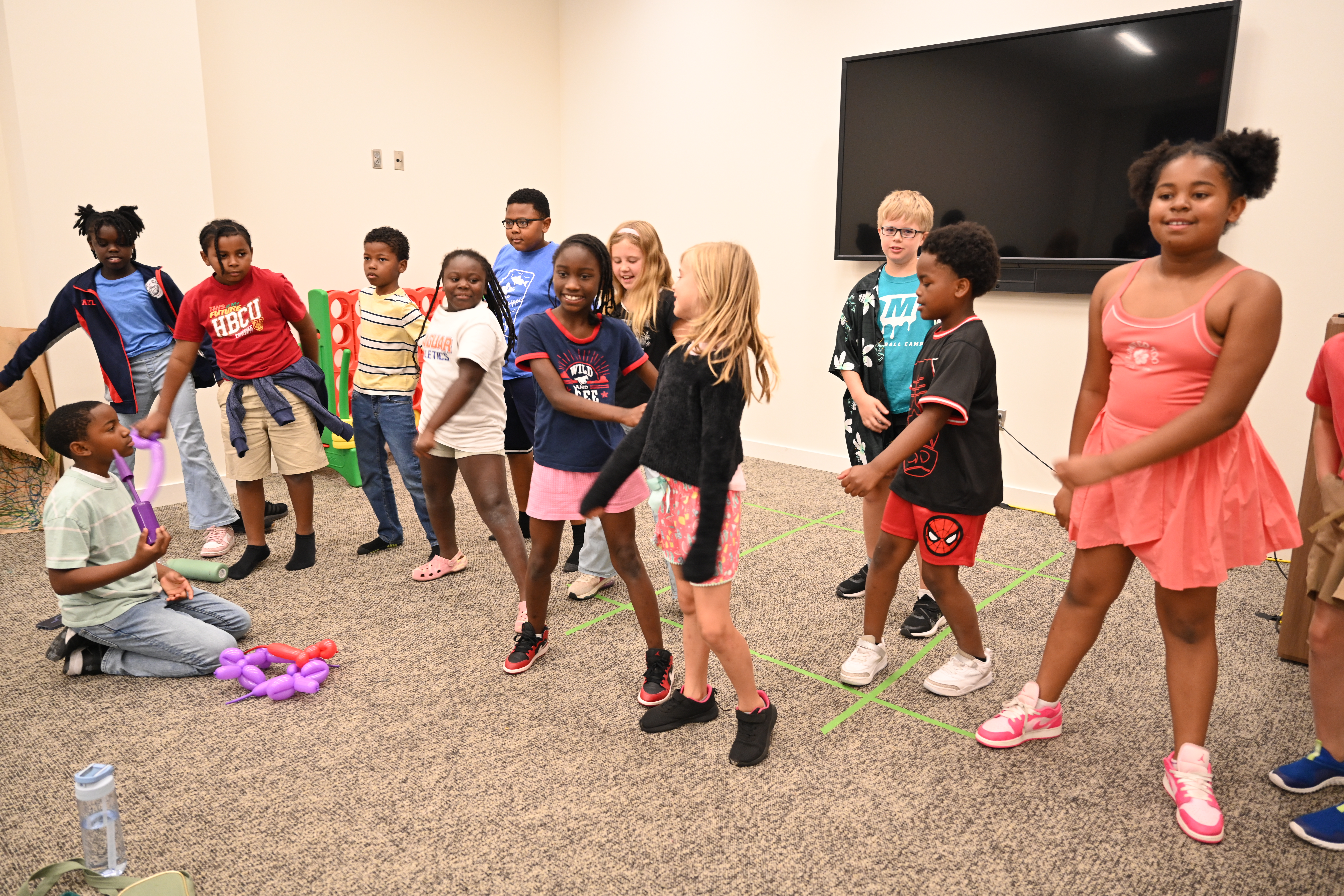 Summer camp students dance at the Two Mississippi Museums