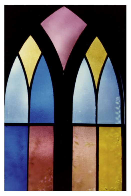 Picture of a colorful stained glass window. 