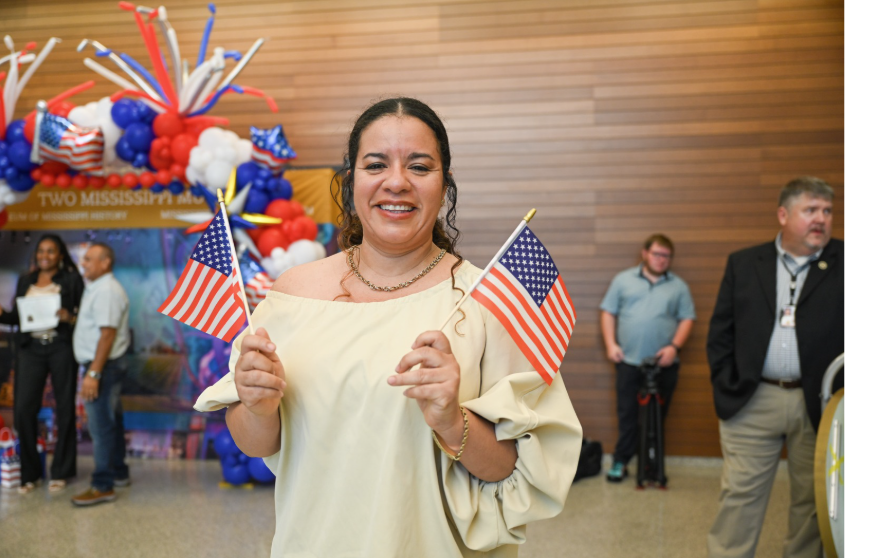 Jimenez with two American flags